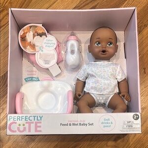 Perfectly Cute Brown Baby Doll Set with bottle toilet & color change diaper new